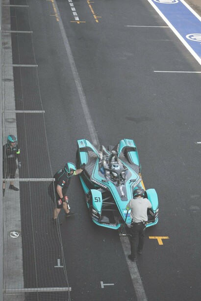 Men wearing helmets to ensure safety before a race