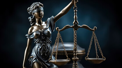 A three-dimensional representation captures the iconic scales of justice, offering a symbolic and visually impactful view