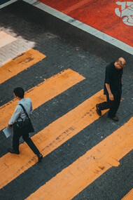 Two men strolling down the street