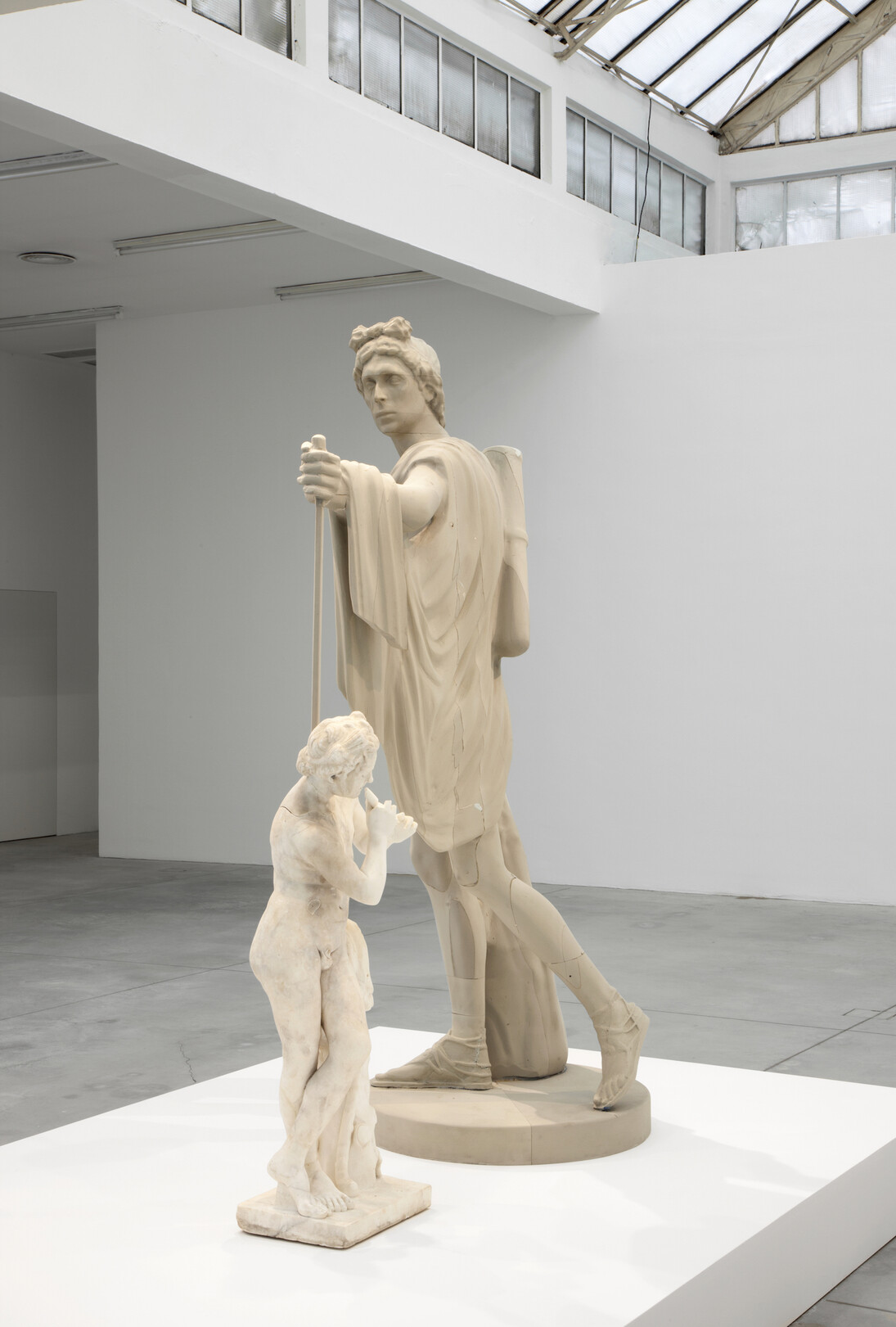 Francesco Vezzoli, Metamorfosi (Self-portrait as Apollo killing the satyr Marsyas),
2015,
2 parts,
Roman Imperial marble figure of a satyr playing the pipe, self-portrait polyurethane sculpture,
Satyr: 112,1 cm / Apollo: 220 cm
