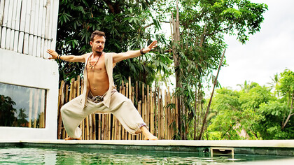 A man engaged in qigong practice for holistic wellness