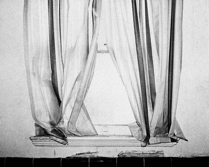 The Hollywood Suites (Windows) #8, 1977 Gelatin silver print; printed c.1977, 9 5/8 x 12 5/8 inches, Edition 3 of 15. Signed, dated and numbered in pencil on print verso.Copyright Steve Kahn, courtesy of Howard Greenberg Gallery, New York.