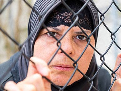 Middle Eastern refugee woman facing challenges due to Safe Third Countries deal during Mediterranean migration