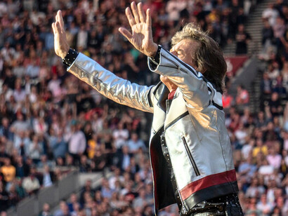 Mick Jagger turned clothing into performance, helping redefine masculinity and stage style in rock music