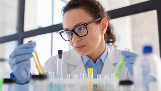 A scientist holding a test tube illustrates the crucial role of science communication in research, with scientific advisors ensuring that findings are effectively shared with and understood by the public