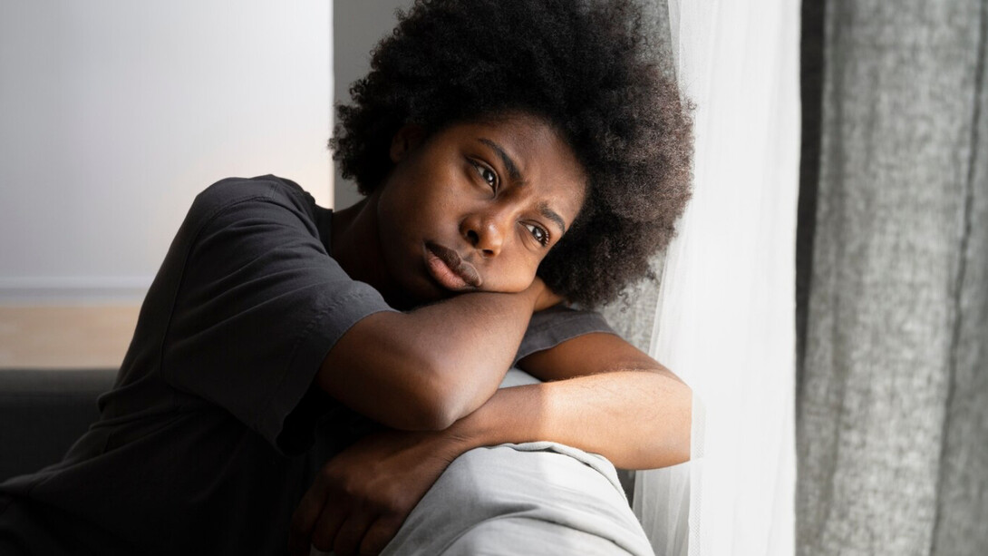A women feeling the crushing pain of domestic violence and navigating through it